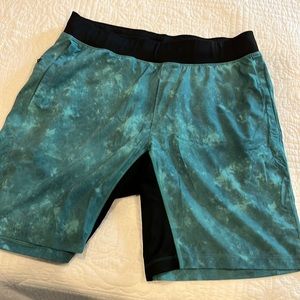 Lululemon Pace breaker 7” inseam liner-less men’s athletic shorts.